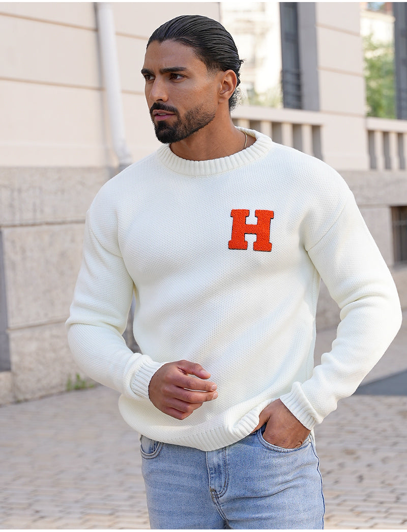 Pull épais avec la lettre H