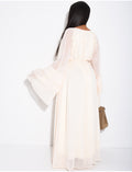 Robe longue en voile à volants