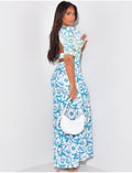 Robe longue dos nu à motifs floral