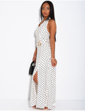 Robe longue dos nu à pois et broche à la taille