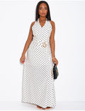 Robe longue dos nu à pois et broche à la taille