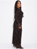 Robe longue en tulle doublé à motifs brodés