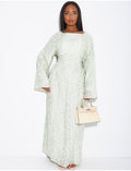 Robe longue doublée à motifs fleurs brodées