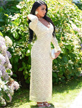 Robe longue en dentelle à manches évasées