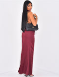 Robe longue moulante en satin effet froncé et dos nu
