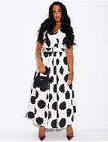 Robe sans manche à pois et ceinture assortie
