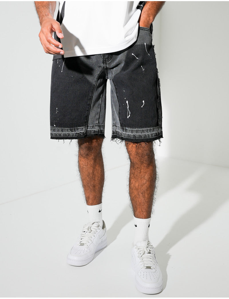 Short en jeans à empiècements contrastants & tâches de peinture