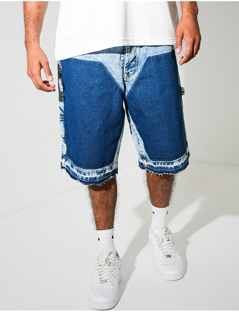 Short en jeans à empiècements contrastants