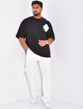 T-shirt avec trèfle brodé