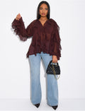 Blouse en voile transparent à volants