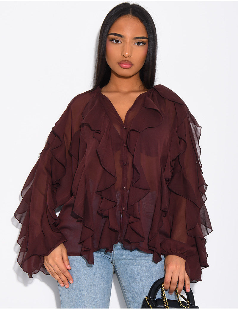 Blouse en voile transparent à volants