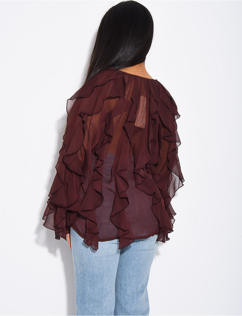 Blouse en voile transparent à volants