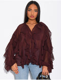 Blouse en voile transparent à volants