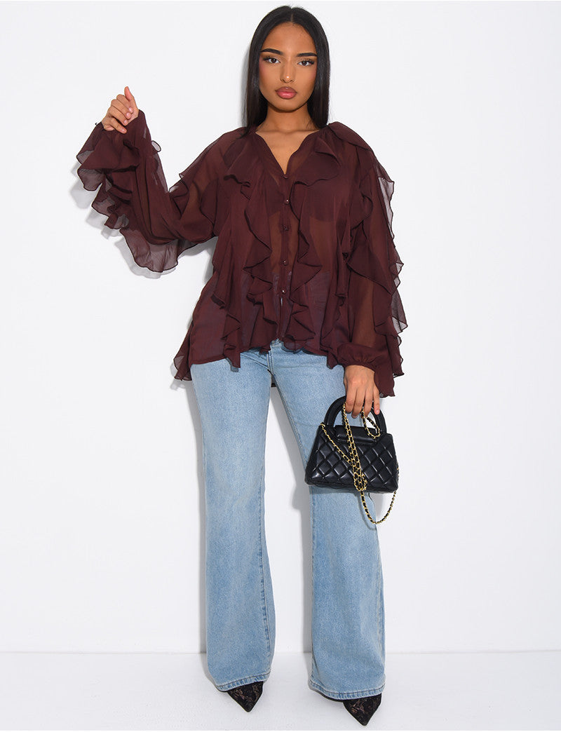 Blouse en voile transparent à volants