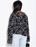 Top ajouré à fleurs avec ceinture assortie