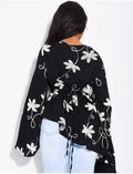 Top effet lin asymétrique à nouer avec motifs brodés