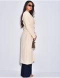 Manteau très cintré à boutons dorés