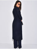 Manteau très cintré à boutons dorés