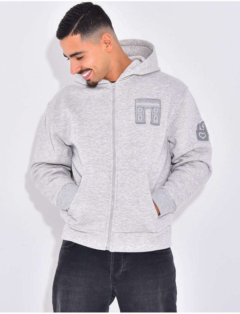 Veste à capuche avec arc de triomphe