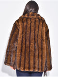 Manteau mi-long en fausse fourrure