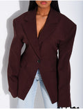 Veste de blazer épaules structurées et cintrée à la taille