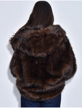 Veste oversize en fausse fourrure à capuche