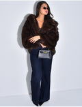 Veste oversize en fausse fourrure à capuche