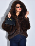 Veste oversize en fausse fourrure à capuche