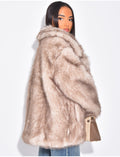 Manteau mi long en fausse fourrure