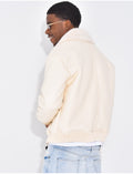 Veste en similicuir avec fourrure au col